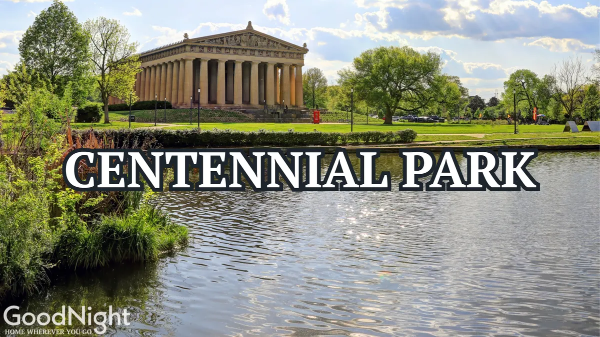 A tranquil city park scene featuring a large replica of the Parthenon, a serene lake, and lush greenery, inviting for family strolls, picnics, and outdoor activities.